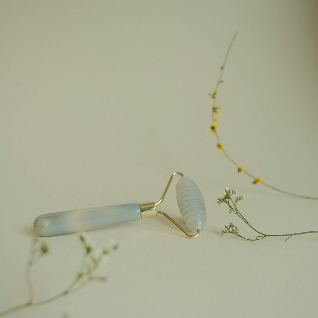 blue agate face roller with spikes